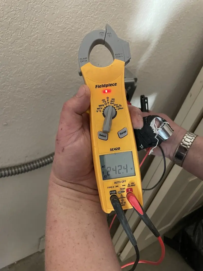 Voltage testing with clamp meter during Electrical Installation Services in Scappoose